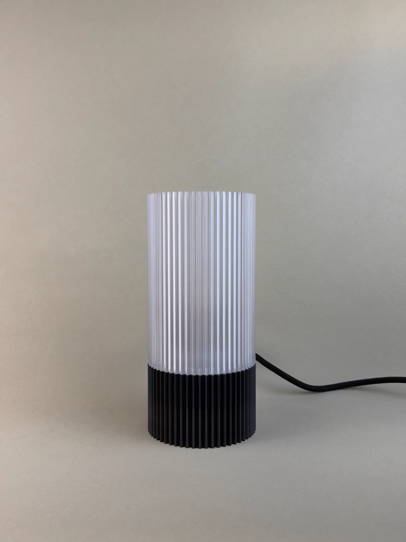 The Samarel table lamp, Clear shade on a Charcoal base